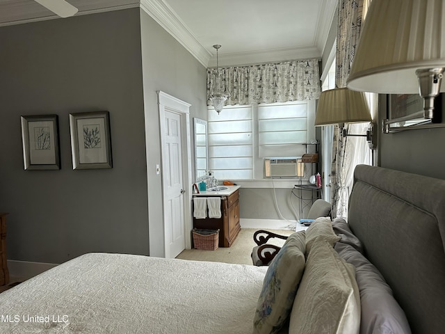 bedroom with cooling unit, light colored carpet, crown molding, and baseboards