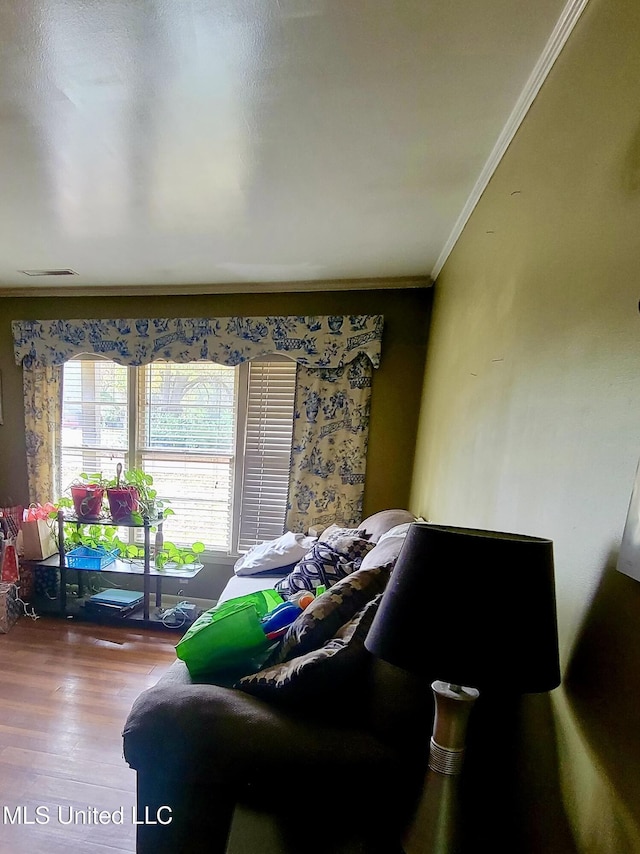 201 Seymour Dr, Indianola, MS 38751 - living area with wood finished floors and crown molding