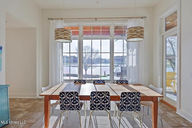 dining area with a water view