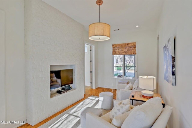 living room with hardwood / wood-style flooring