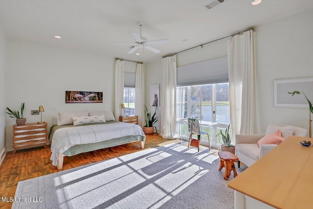 bedroom featuring wood-type flooring and ceiling fan