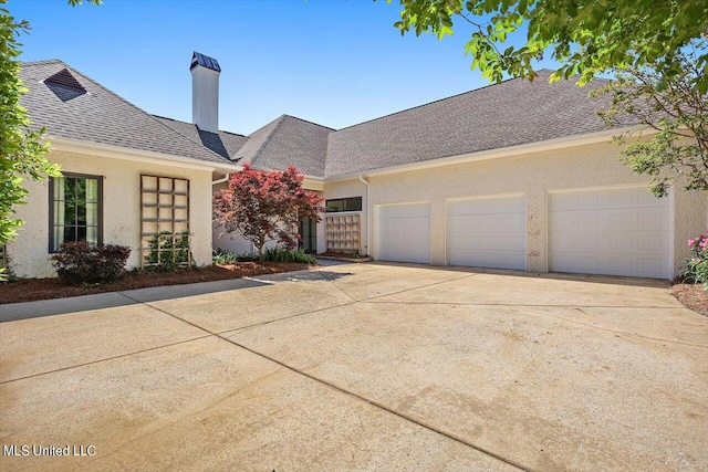 view of front of home featuring a garage