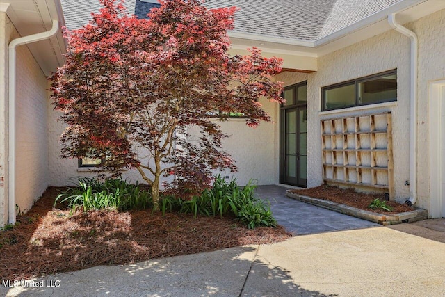 doorway to property with a patio