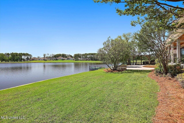 view of yard with a water view