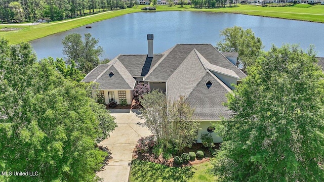 bird's eye view with a water view