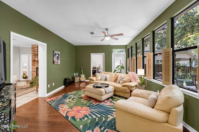 807 Woodglen Dr, Ocean Springs, MS 39564 - living room with ceiling fan, wood finished floors, and baseboards