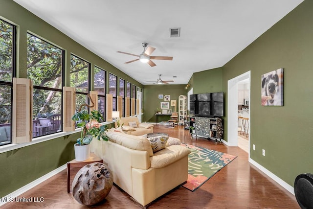 807 Woodglen Dr, Ocean Springs, MS 39564 - living room with ceiling fan, wood finished floors, and baseboards