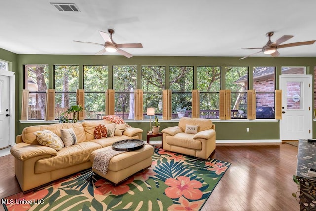 807 Woodglen Dr, Ocean Springs, MS 39564 - living room with a ceiling fan, plenty of natural light, and wood-type flooring