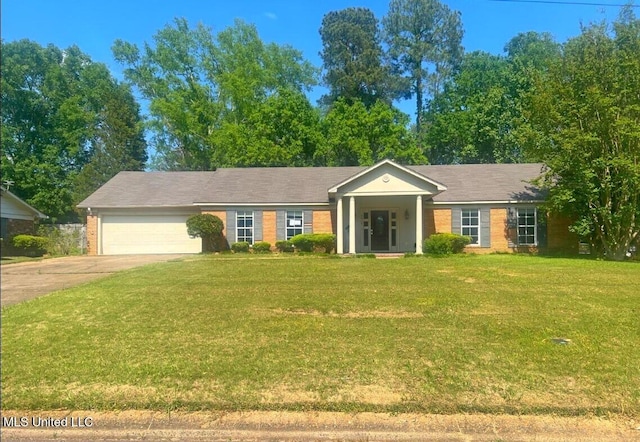 5846 Baxter Dr, Jackson, MS 39211 - view of front facade with concrete driveway, brick siding, an attached garage, and a front yard
