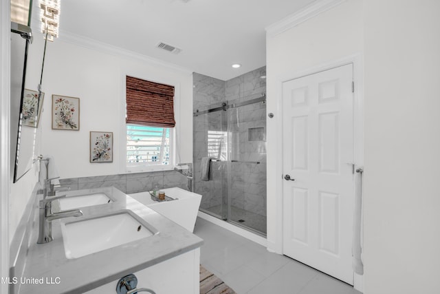 bathroom featuring ornamental molding, a sink, visible vents, and a shower stall