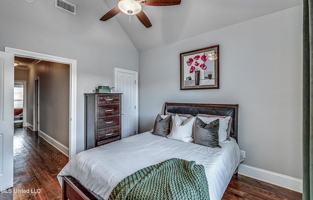 bedroom with ceiling fan, visible vents, dark wood finished floors, baseboards, and high vaulted ceiling