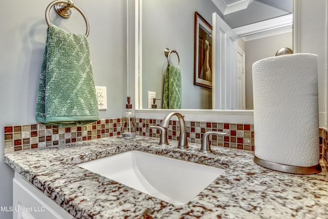 bathroom with vanity and backsplash