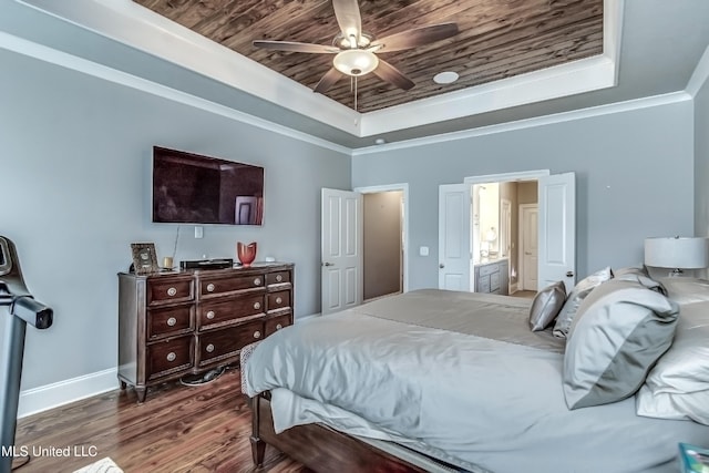 bedroom with baseboards, ensuite bathroom, dark wood-type flooring, a tray ceiling, and wood ceiling