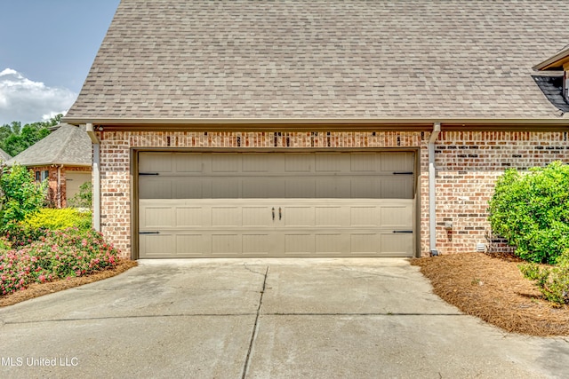 garage with driveway