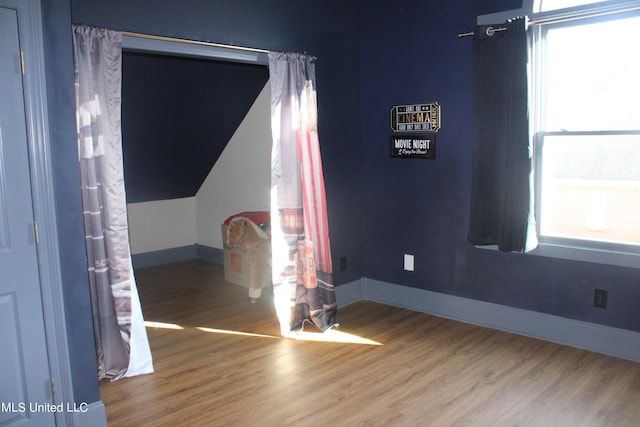 spare room featuring hardwood / wood-style flooring