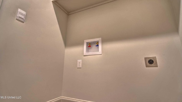 laundry area featuring baseboards, washer hookup, and hookup for an electric dryer
