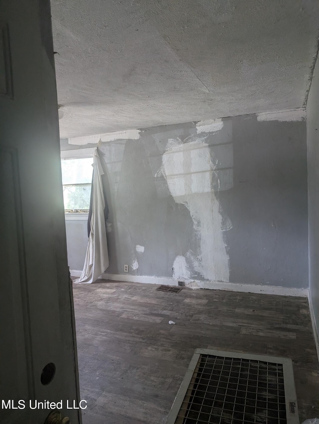 bathroom featuring a textured ceiling