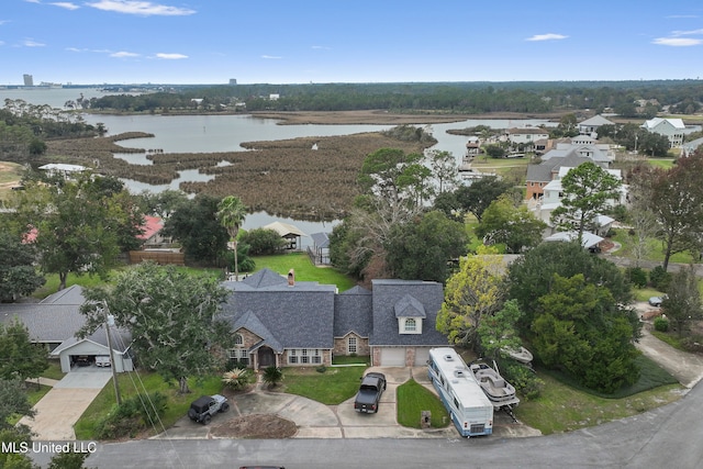 drone / aerial view featuring a water view