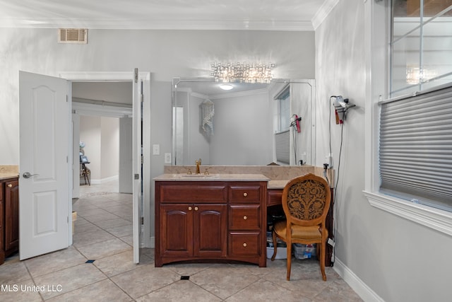 bathroom with tile patterned flooring, vanity, and crown molding