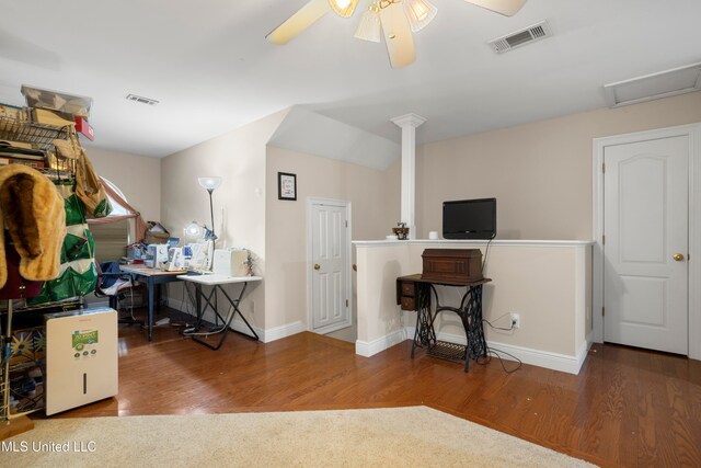 office with wood-type flooring and ceiling fan