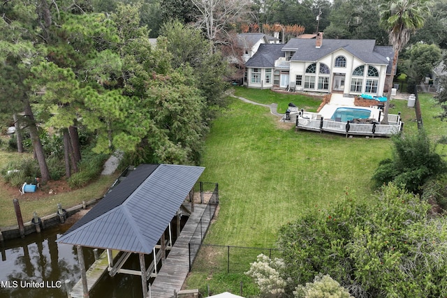 birds eye view of property featuring a water view