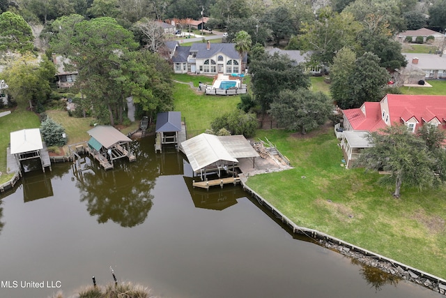 bird's eye view with a water view