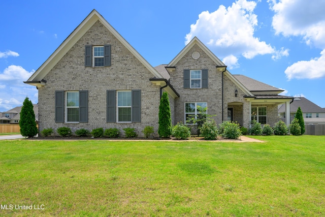 4432 John Wood Ln, Olive Branch, MS 38654 - view of front of property featuring a front yard and brick siding