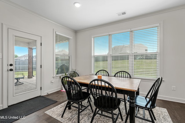 4432 John Wood Ln, Olive Branch, MS 38654 - dining area featuring dark wood-type flooring and baseboards