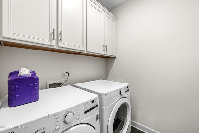 4432 John Wood Ln, Olive Branch, MS 38654 - laundry room with washing machine and dryer and cabinet space