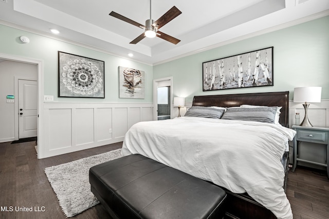 4432 John Wood Ln, Olive Branch, MS 38654 - bedroom with a raised ceiling, recessed lighting, dark wood-type flooring, wainscoting, and a ceiling fan