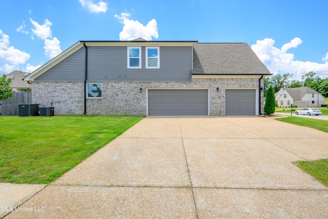 4432 John Wood Ln, Olive Branch, MS 38654 - view of side of home with concrete driveway and brick siding