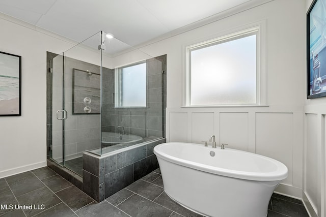 4432 John Wood Ln, Olive Branch, MS 38654 - full bath featuring a freestanding bath, a shower stall, and a decorative wall