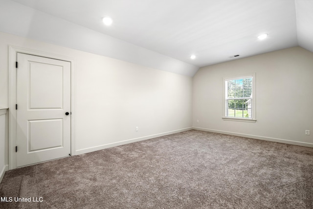 4432 John Wood Ln, Olive Branch, MS 38654 - empty room with vaulted ceiling, carpet flooring, and recessed lighting