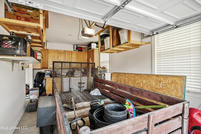 4432 John Wood Ln, Olive Branch, MS 38654 - garage featuring a garage door opener