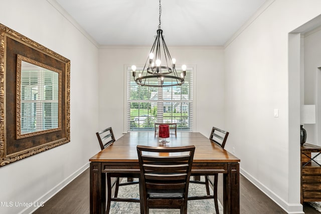 4432 John Wood Ln, Olive Branch, MS 38654 - dining room with dark wood-style flooring, a chandelier, and crown molding