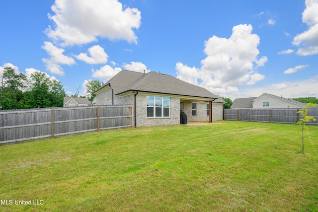 4432 John Wood Ln, Olive Branch, MS 38654 - rear view of property featuring a fenced backyard and brick siding