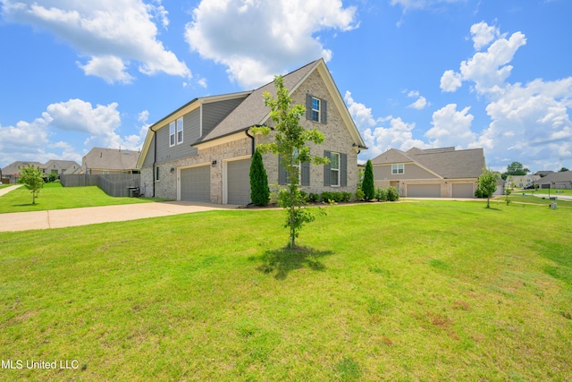 4432 John Wood Ln, Olive Branch, MS 38654 - view of front of house with concrete driveway, brick siding, an attached garage, and a residential view