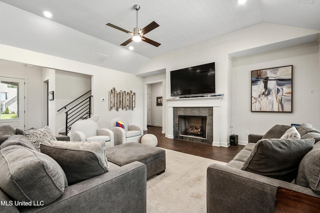 4432 John Wood Ln, Olive Branch, MS 38654 - living room with vaulted ceiling, stairs, ceiling fan, wood finished floors, and a fireplace