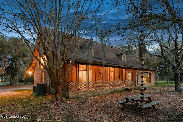 view of property exterior featuring central AC unit