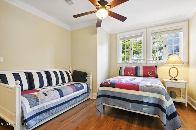 600 N Beach Blvd, Bay Saint Louis, MS 39520 - bedroom featuring wood finished floors, crown molding, and ceiling fan