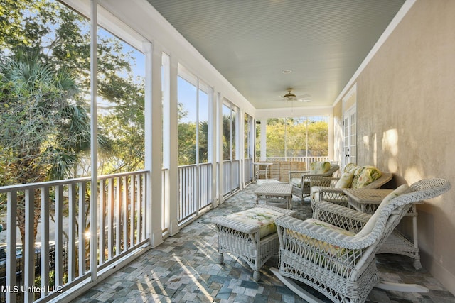 600 N Beach Blvd, Bay Saint Louis, MS 39520 - sunroom with a ceiling fan
