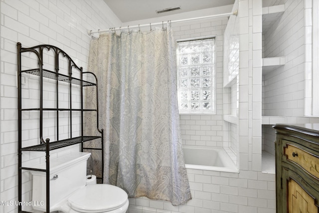 600 N Beach Blvd, Bay Saint Louis, MS 39520 - full bath featuring toilet and tiled shower / bath