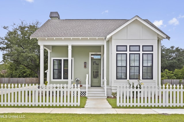 435 Bills Ave, Ocean Springs, MS 39564 - view of front facade with a shingled roof and covered porch