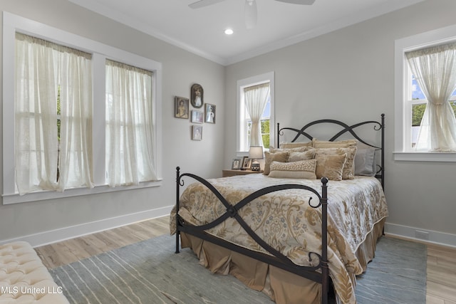 435 Bills Ave, Ocean Springs, MS 39564 - bedroom featuring baseboards, wood finished floors, ornamental molding, ceiling fan, and recessed lighting