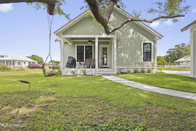 435 Bills Ave, Ocean Springs, MS 39564 - view of front of property featuring a ceiling fan, a porch, and a front yard