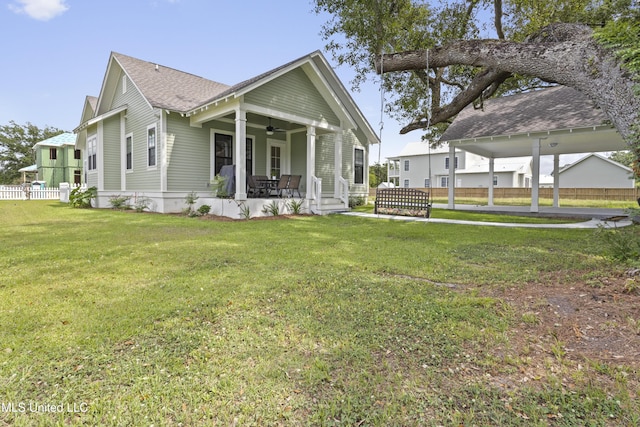 435 Bills Ave, Ocean Springs, MS 39564 - back of property with a ceiling fan and roof with shingles