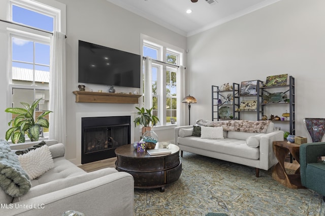 435 Bills Ave, Ocean Springs, MS 39564 - living area featuring crown molding, a fireplace, recessed lighting, and a towering ceiling