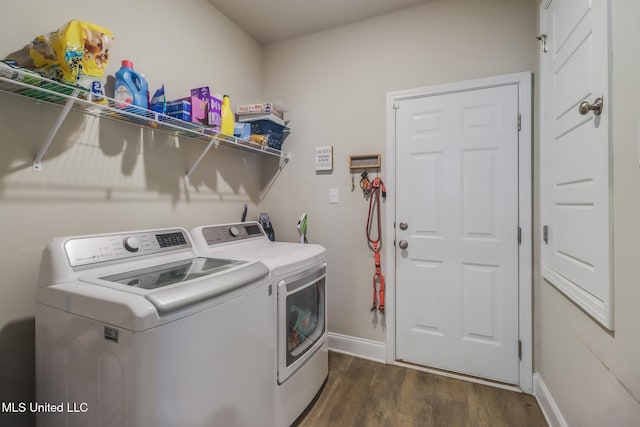 11458 Leann Ct, Ocean Springs, MS 39564 - laundry room featuring separate washer and dryer, dark wood finished floors, and baseboards