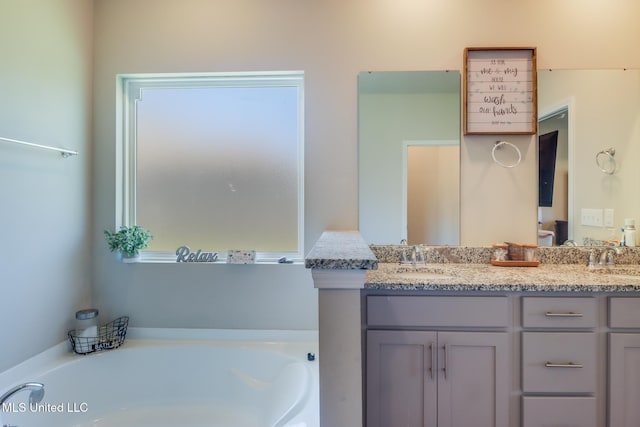 11458 Leann Ct, Ocean Springs, MS 39564 - bathroom with a bath and double vanity