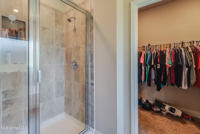 11458 Leann Ct, Ocean Springs, MS 39564 - bathroom with a shower stall and a spacious closet